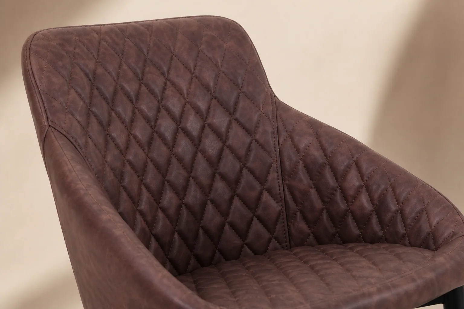 Close view of HTC0093 diamond stitching and wrapped upholstered sides