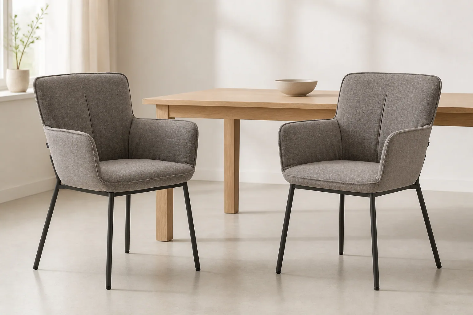 Two HTC0228 grey upholstered dining chairs beside a light oak table